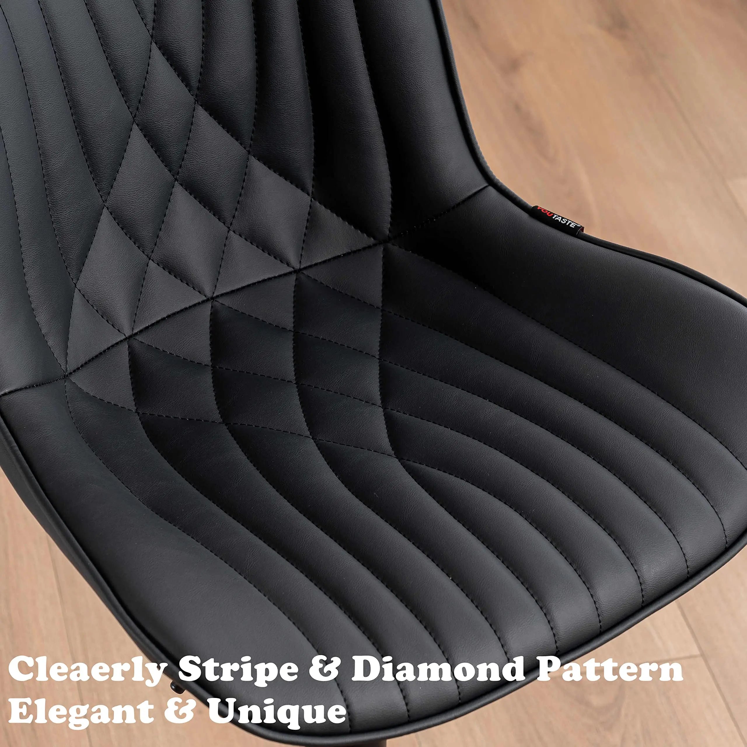 Close-up of premium black PU leather on DYPODTEN Bar Stools Set of 2, featuring soft texture and easy-to-clean material for modern kitchen and dining room use